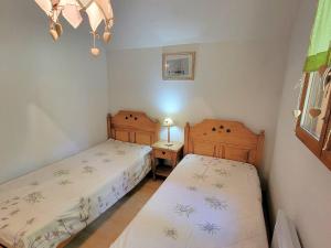 Appartements Duplex 8/9 pers avec terrasse Sud, proche pistes, Wi-Fi, animaux OK, parking + options - FR-1-393-92 : photos des chambres