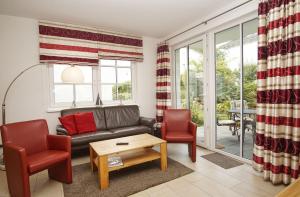 Terrasse, gratis Nutzung vom AHOI Erlebnisbad und Sauna in Sellin - Villa Antje FeWo 04