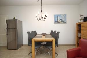 Terrasse, gratis Nutzung vom AHOI Erlebnisbad und Sauna in Sellin - Villa Antje FeWo 04