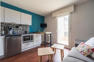 Maisons de vacances Les Pieds dans l-Eau Studio a Trebeurden plage : photos des chambres