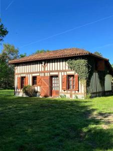 Maisons de vacances Gite du Maou - Maison avec piscine : photos des chambres