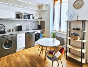Appartements Cosy appartement centre ville parking Netflix : photos des chambres