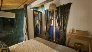 Maisons de vacances KABANE 54, Lodge avec spa au bord de l-eau : photos des chambres