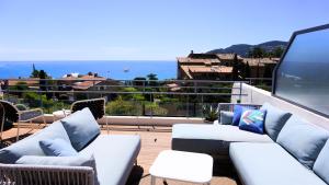 Villas Villa avec Rooftop, Jacuzzi & vue mer by Palmazur : photos des chambres