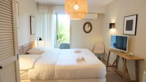 Villas Villa avec Rooftop, Jacuzzi & vue mer by Palmazur : photos des chambres