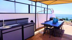 Villas Villa avec Rooftop, Jacuzzi & vue mer by Palmazur : photos des chambres