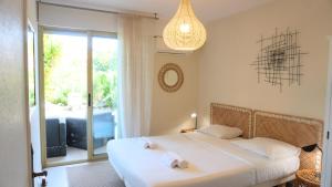 Villas Villa avec Rooftop, Jacuzzi & vue mer by Palmazur : photos des chambres