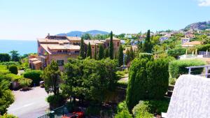 Villas Villa avec Rooftop, Jacuzzi & vue mer by Palmazur : photos des chambres