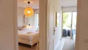 Villas Villa avec Rooftop, Jacuzzi & vue mer by Palmazur : photos des chambres