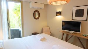 Villas Villa avec Rooftop, Jacuzzi & vue mer by Palmazur : photos des chambres