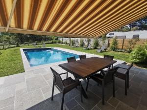 Maisons de vacances Fleurs : photos des chambres