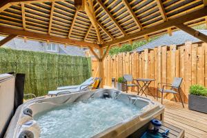 Appartements Domaine du Gros Chene - terrasses avec jacuzzis privatifs : photos des chambres