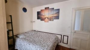 Appartements Chez Sophie, cosy et calme, a deux pas de Paris : photos des chambres