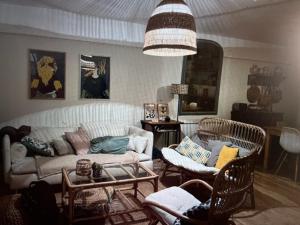 Maisons de vacances Charmante maison de vacances : photos des chambres