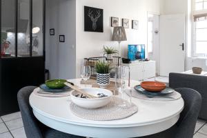 Appartements Le Temps d'Eugene Centre historique : photos des chambres