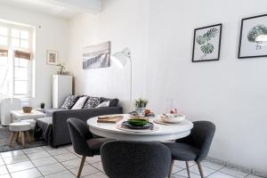 Appartements Le Temps d'Eugene Centre historique : photos des chambres