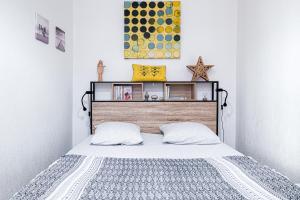 Appartements Le Temps d'Eugene Centre historique : photos des chambres