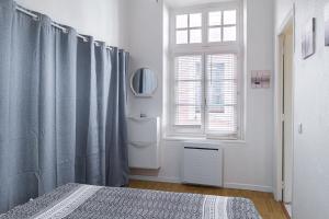 Appartements Le Temps d'Eugene Centre historique : photos des chambres