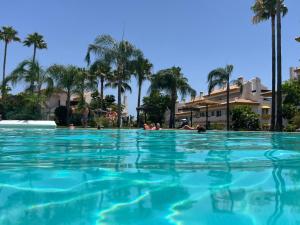 Modern Sea & Golf View 2-Bedroom Apartment with Pool and Terrace in Mijas