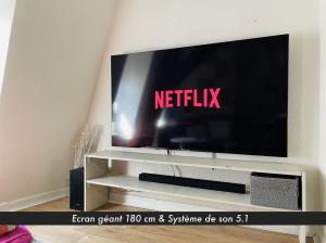 Appartements Le Grand Mirebeau - Parking prive : photos des chambres