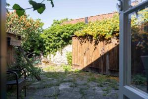 Charming Garden View Apartment with Terrace & grill