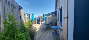 Maisons de vacances Aux Passagers de la Baie : photos des chambres