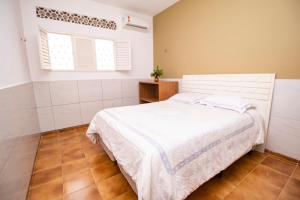 Quarto amplo ao lado do mar