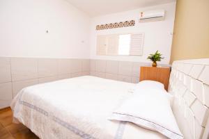 Quarto amplo ao lado do mar