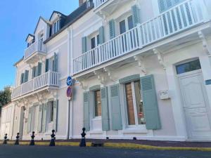 Villas Villa Amica, Terrasse et jardin, a 50m de la plage : photos des chambres