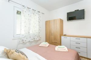 Secluded holiday house Kastel Stari, Kastela - 23384