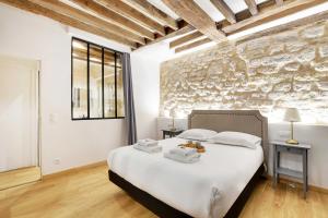 Appartement Chic au Cœur du 9ème 2 chambres 6P