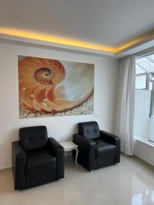 Cobertura 5 suites frente mar Guarujá Pitangueiras