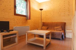 Chalets Les Chataigniers du Lac : photos des chambres