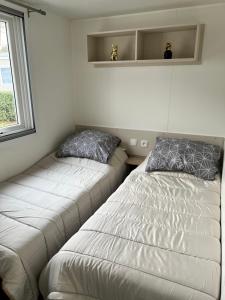 Campings Magnifique mobil-home : photos des chambres