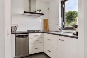 Vakantiehuis aan het water -incl laadpaal-