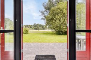 Vakantiehuis aan het water -incl laadpaal-