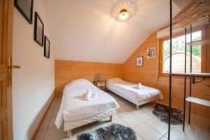 Chalets Chalet Sequoia - Spa et Sauna : photos des chambres