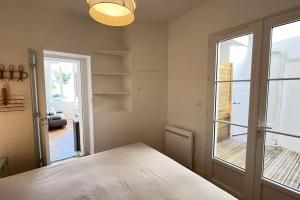 Appartements La Corderie - Appartement sur le Quai aux Vivres : photos des chambres