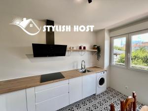 Stylish host ,Fabuloso piso a 100m de la playa del Ris