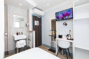 Hotels HOTEL DE PARIS MONTPARNASSE : photos des chambres