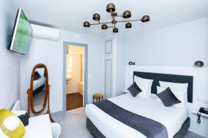 Hotels HOTEL DE PARIS MONTPARNASSE : photos des chambres