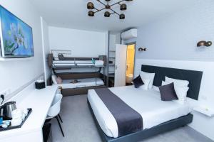 Hotels HOTEL DE PARIS MONTPARNASSE : photos des chambres