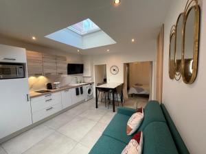 Appartements Maison rouge : photos des chambres