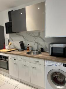 Appartements Grand T2 climatise avec jardin et spa : photos des chambres