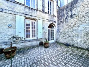 Appartements Le Puyravault - Studio situe en plein centre-ville & proche des thermes : photos des chambres