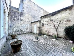 Appartements Le Puyravault - Studio situe en plein centre-ville & proche des thermes : photos des chambres