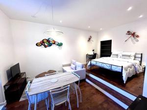 Appartements Le Puyravault - Studio situe en plein centre-ville & proche des thermes : photos des chambres