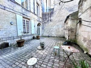 Appartements Le Puyravault - Studio situe en plein centre-ville & proche des thermes : photos des chambres