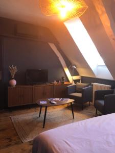 Sejours chez l'habitant La Maison aux murs anciens et ses chambres : photos des chambres