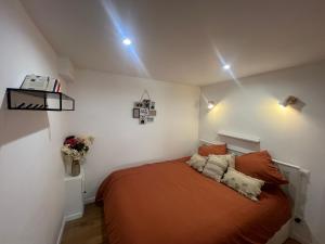 Appartements Le cocon du rez de jardin : photos des chambres